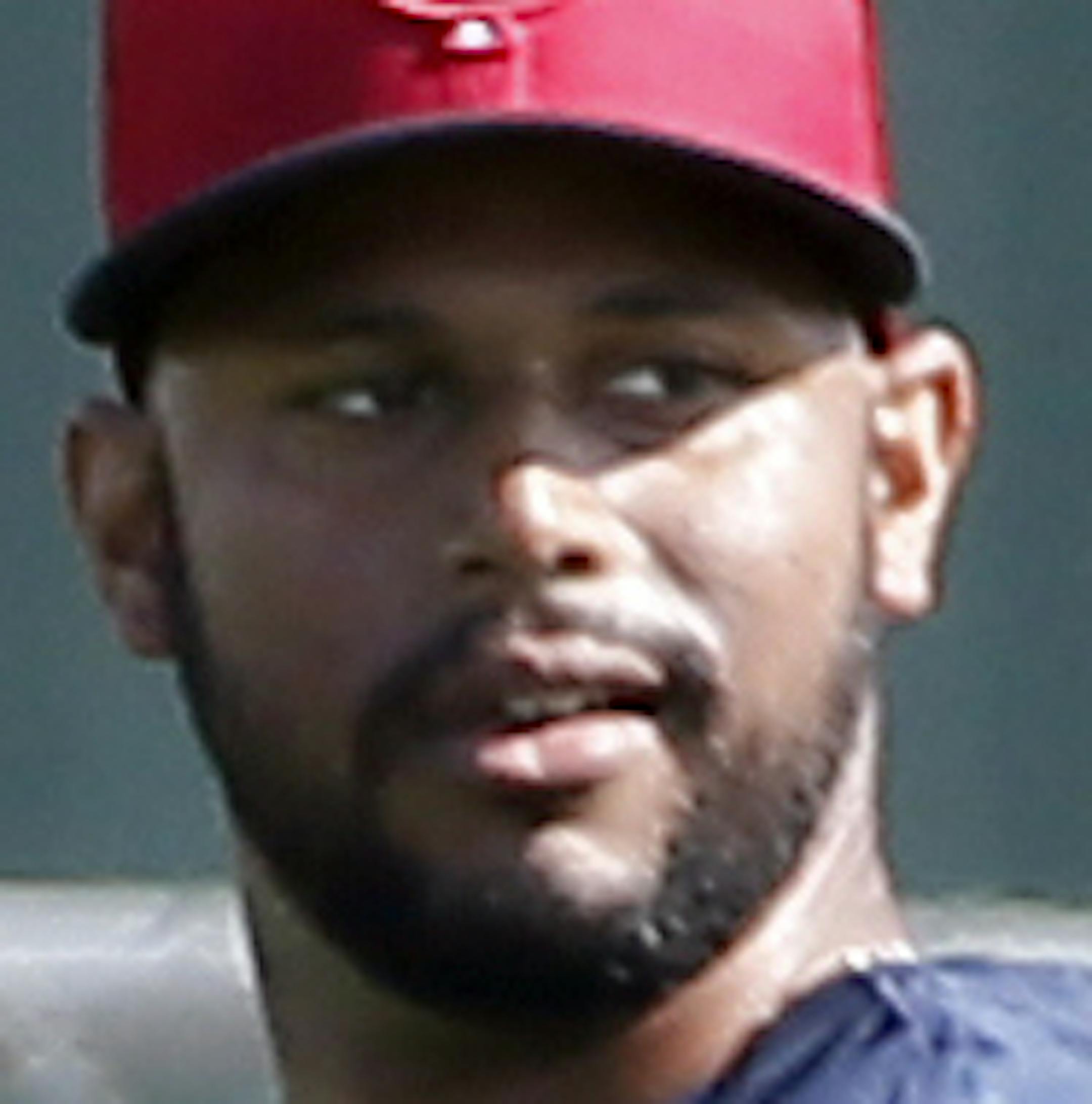 Minnesota Twins center fielder Aaron Hicks throws the ball in as he participates in fielding drills at baseball spring training in Fort Myers Fla., Tuesday Feb. 24, 2015. (AP Photo/Tony Gutierrez)