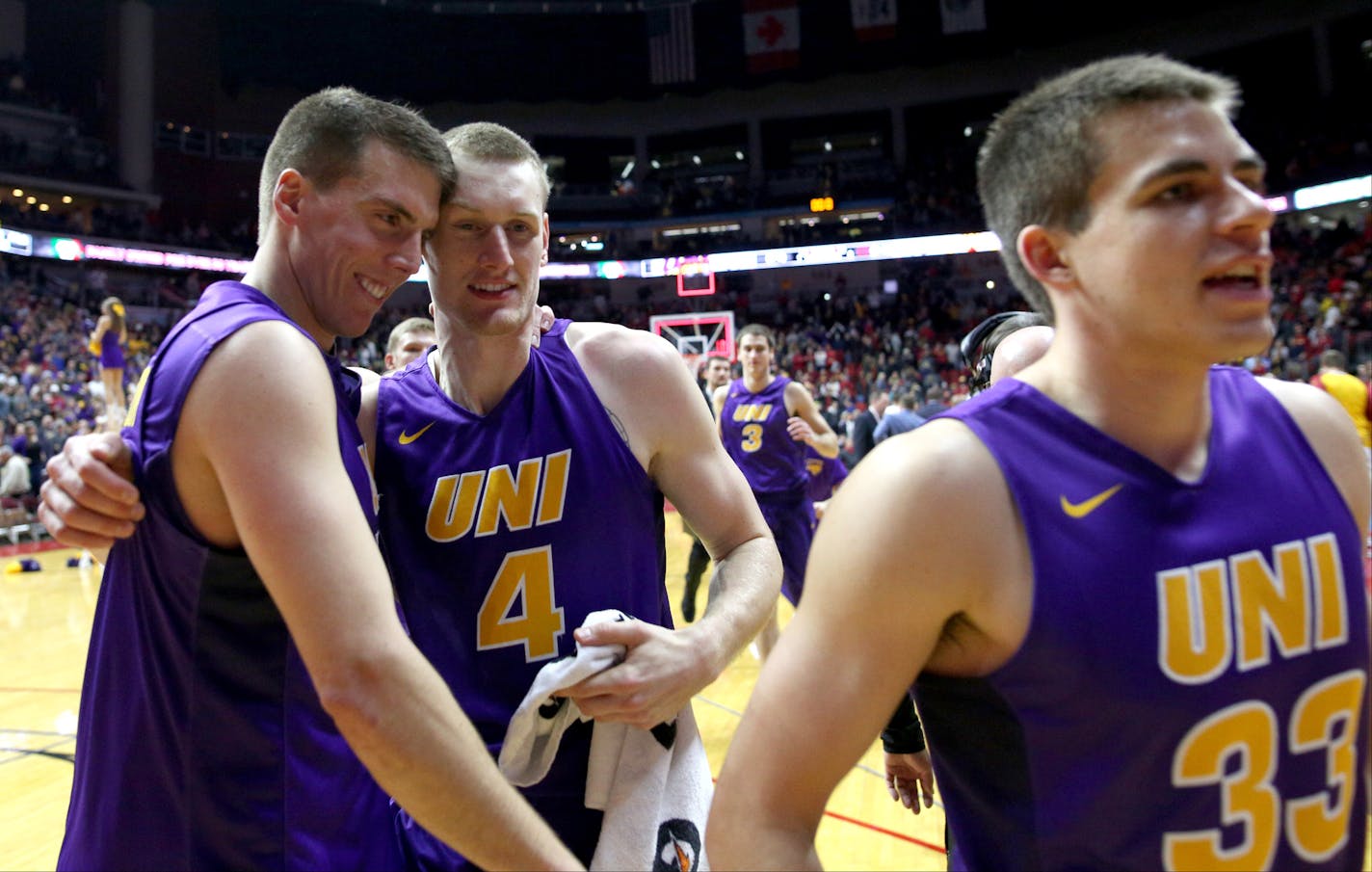 Northern Iowa guards Matt Bohannon, left, and Paul Jesperson celebrate as they come off the court after defeating Iowa State 81-79 in an NCAA college basketball game, Saturday, Dec. 19, 2015, in Des Moines, Iowa. (AP Photo/Justin Hayworth)