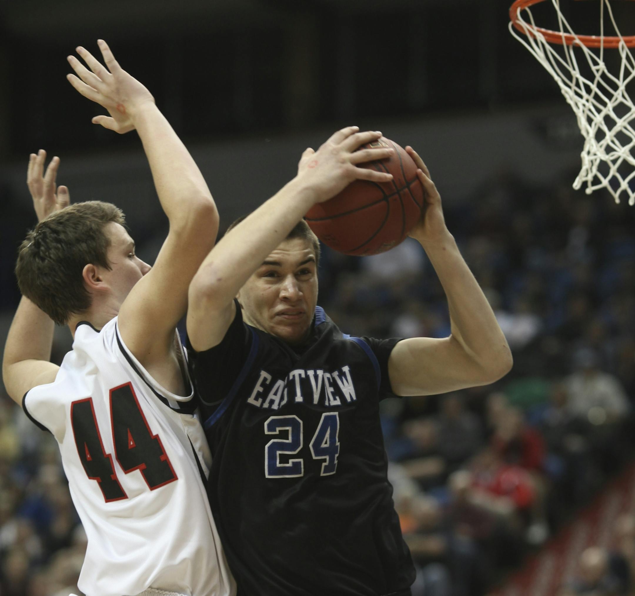 Eastview's Joey King pulled down a rebound Eden Prairie's Jordan Peterson during the first half of the Class 4A quarterfinals at Target Center in 2012. King played at Drake last season but is set to join the Gophers.