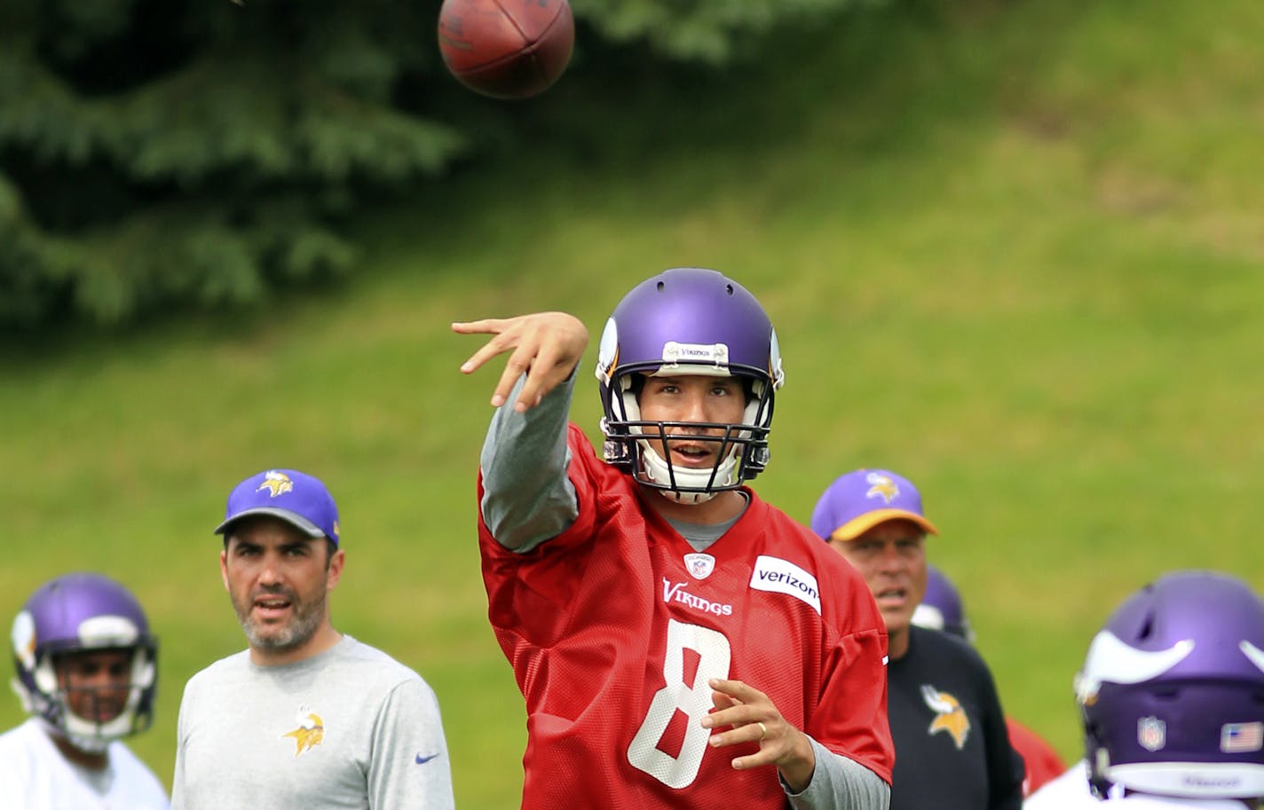 Minnesota Vikings quarterback Sam Bradford (8) throws during NFL football practice, Tuesday, June 13, 2017, in Eden Prairie, Minn. (AP Photo/Andy Clayton-King)