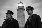 Williem Dafoe and Robert Pattinson in director Robert Eggers THE LIGHTHOUSE. Credit : A24 Pictures