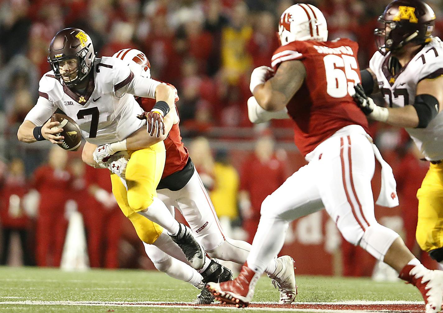 Minnesota's quarterback Mitch Leidner was sacked by Wisconsin's T.J. Watt in the fourth quarter as Minnesota took on Wisconsin at Camp Randall Stadium, Saturday, November 26, 2016 in Madison, Wis. ] (ELIZABETH FLORES/STAR TRIBUNE) ELIZABETH FLORES &#x2022; eflores@startribune.com