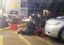 In this Tuesday, July 5, 2016 photo made from video, Alton Sterling is held by two Baton Rouge police officers, with one holding a hand gun, outside a