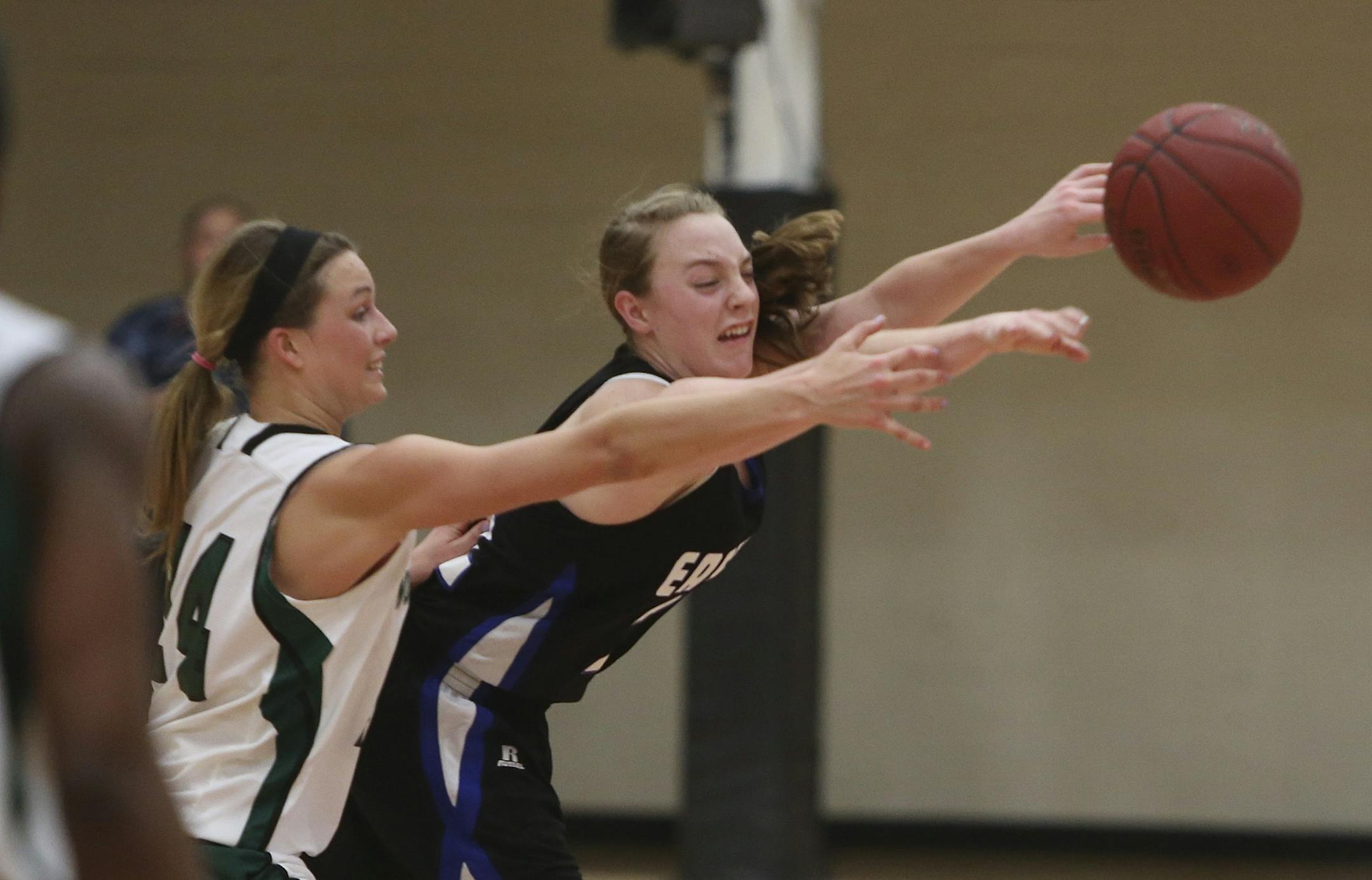 Eastview's Madison Guebert made a pass as Park's Sydney Lamberty played tough defense.