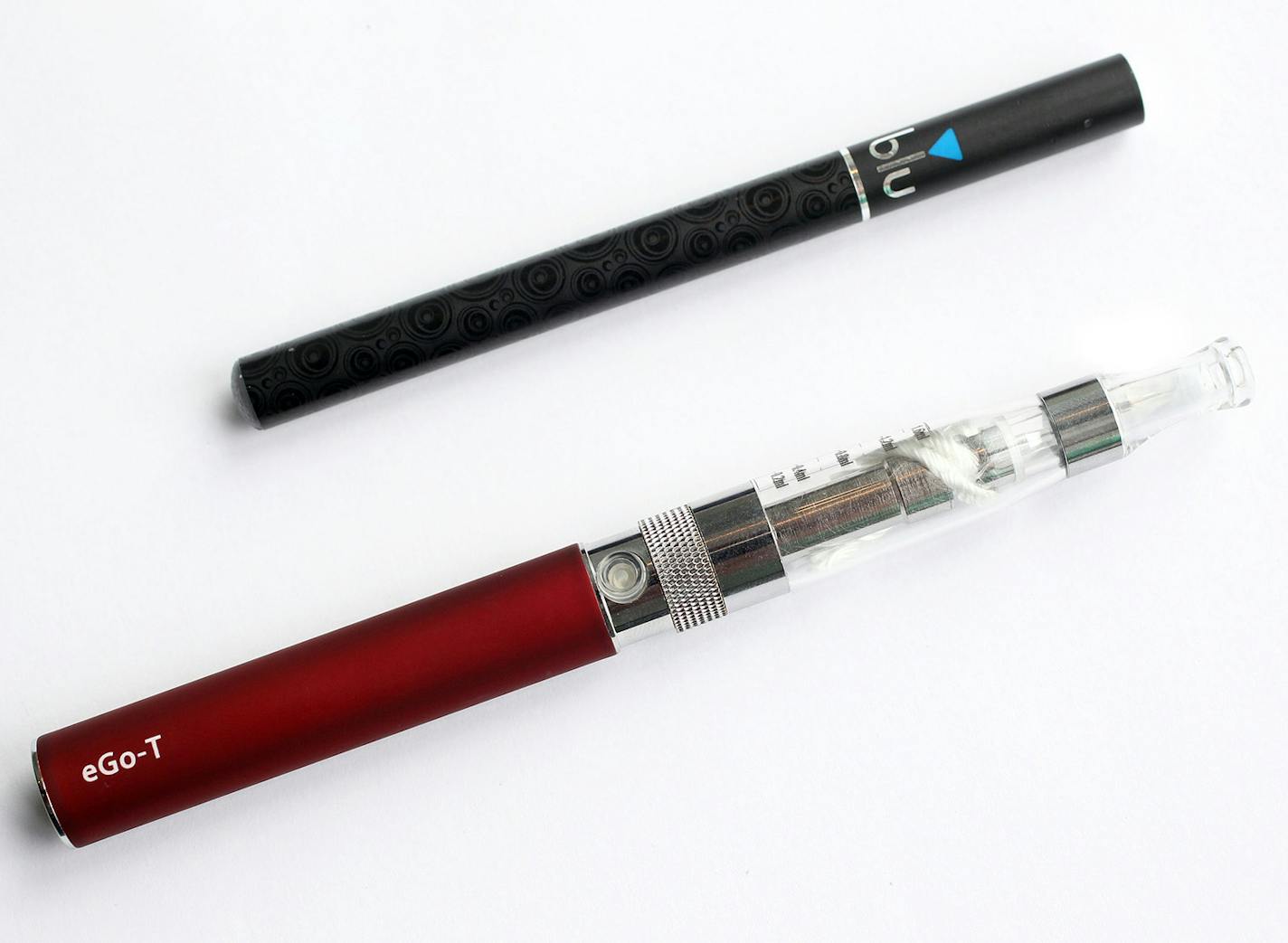 A blu disposable e-cigarette and a eGo-T e-cigarette.