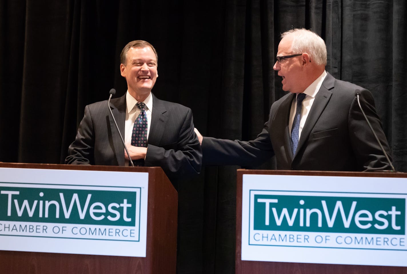 Tim Walz, right, and Jeff Johnson debated at the TwinWest Chamber of Commerce on Sept. 19.