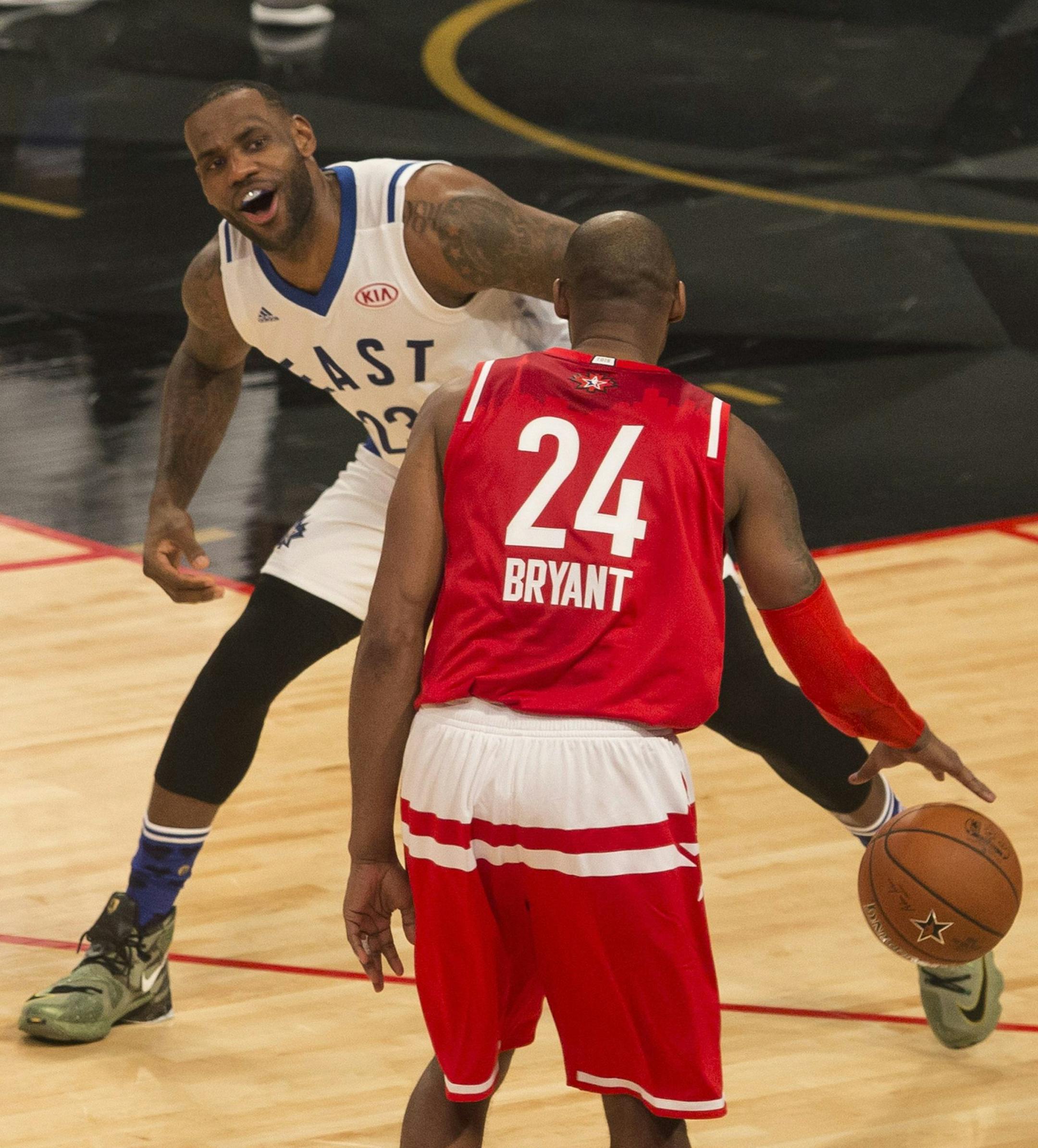 Eastern Conference's LeBron James, of the Cleveland Cavaliers (23) jokingly taunts Western Conference's Kobe Bryant, of the Los Angeles Lakers, (24) during first half NBA All-Star Game basketball action in Toronto on Sunday, Feb. 14, 2016. (Chris Young/The Canadian Press via AP) MANDATORY CREDIT