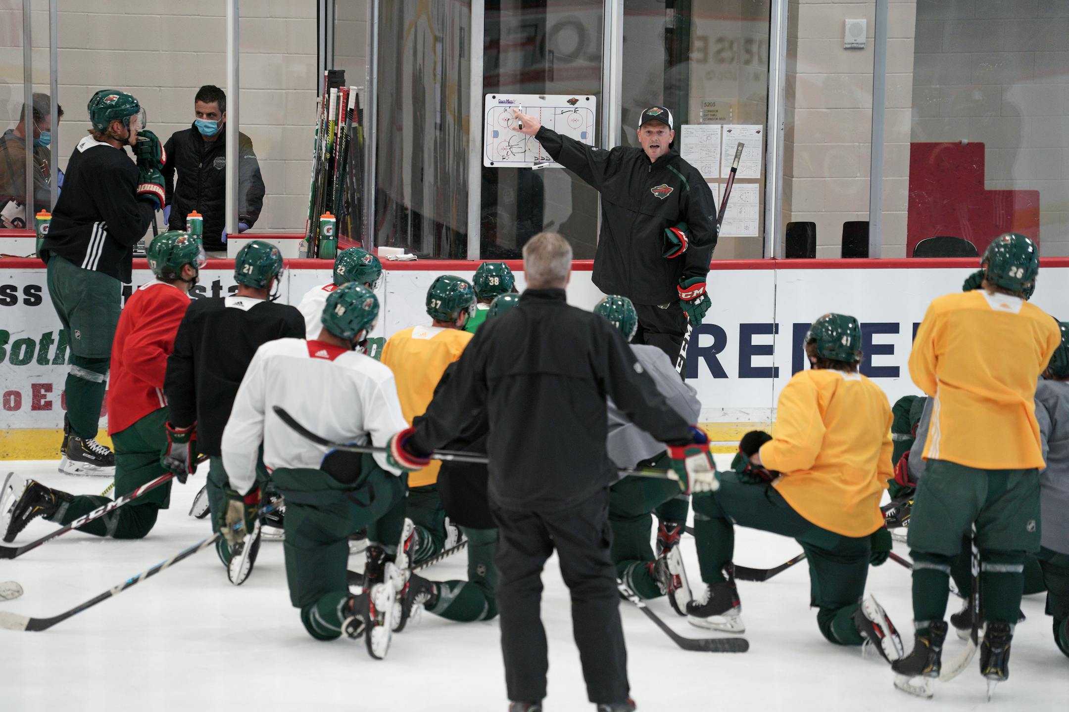 Wild Players took to the ice for practice Friday morning before leaving for Canada to re-start the season.