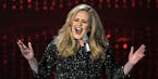 FILE - In this Feb. 24, 2013 file photo, Adele performs during the Oscars at the Dolby Theatre in Los Angeles. NBC said Friday, Oct. 30, 2015, that th