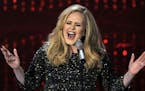FILE - In this Feb. 24, 2013 file photo, Adele performs during the Oscars at the Dolby Theatre in Los Angeles. NBC said Friday, Oct. 30, 2015, that th