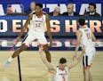 Virginia guard De'Andre Hunter (12) celebrated after making a three point shot during the second half. ] AARON LAVINSKY &#x2022; Aaron.lavinsky@startr