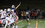 Robbinsdale Cooper blocks an extra point attempt in the fourth quarter to beat Robbinsdale Armstrong 14-13 and earn it's first state tournament berth 