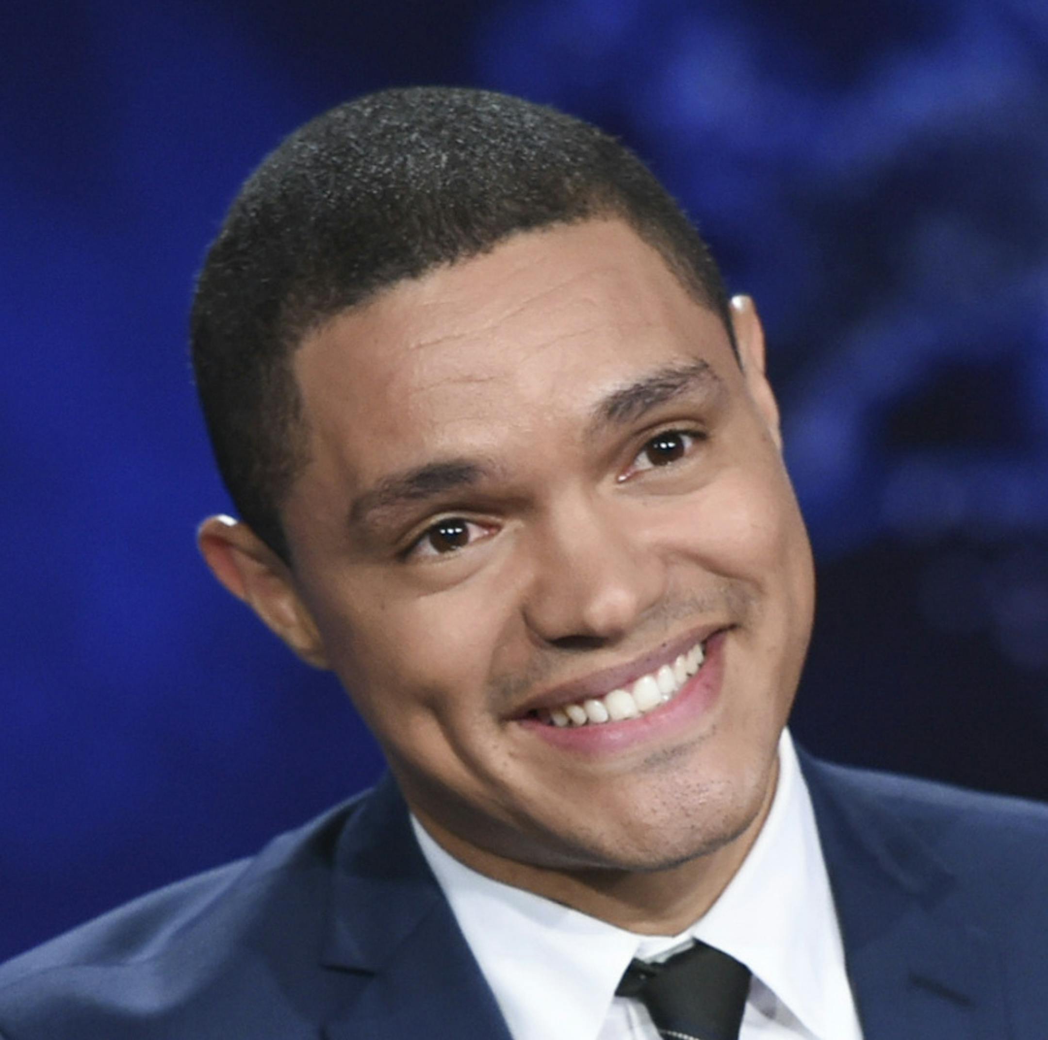 FILE - In this Sept. 29, 2015, file photo, Trevor Noah appears during a taping of "The Daily Show," on Comedy Central, in New York. ìThe Daily Showî with Noah canceled its episode on Tuesday, March 14, 2017, because of the winter storm. The network is airing a rerun instead. (Photo by Evan Agostini/Invision/AP, File)