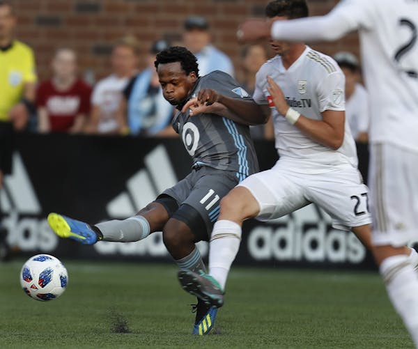 Romario Ibarra(11) makes the most of his time as a substitute against Tristan Blackmon(27).] LAFC faces at MNUF at TCF Bank Stadium on the U of M camp