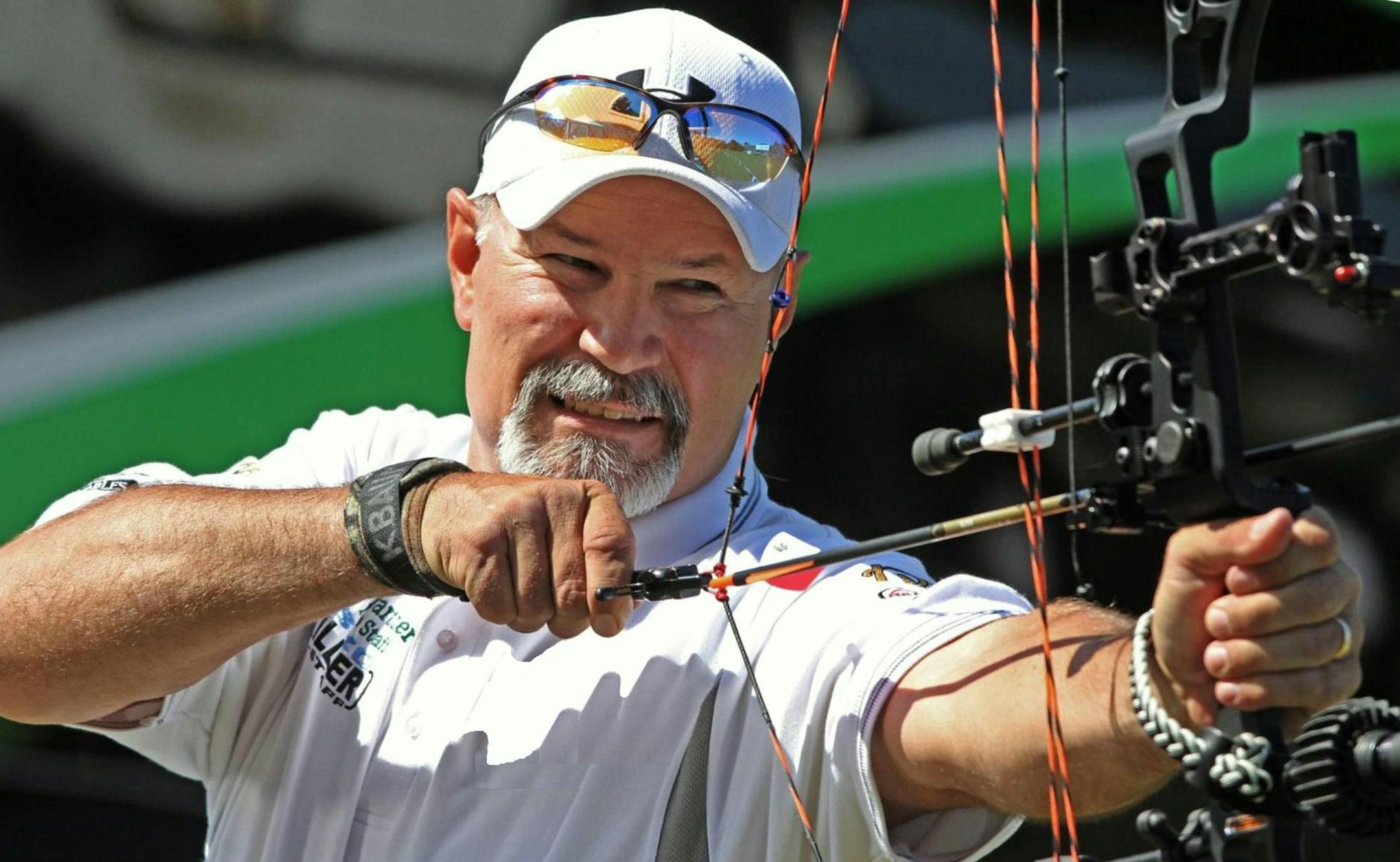 Veteran archer and bow hunter Kurt Baumgartner oversees the 100-yard challenge and other archery events at Game Fair.