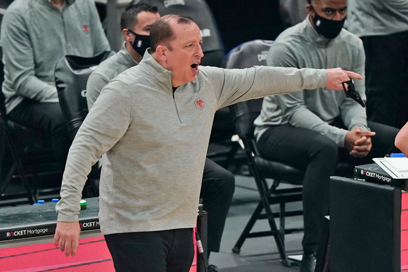 New York Knicks head coach Tom Thibodeau yells instructions to teammates in the first half of an NBA basketball game against the Cleveland Cavaliers, Tuesday, Dec. 29, 2020, in Cleveland. (AP Photo/Tony Dejak)