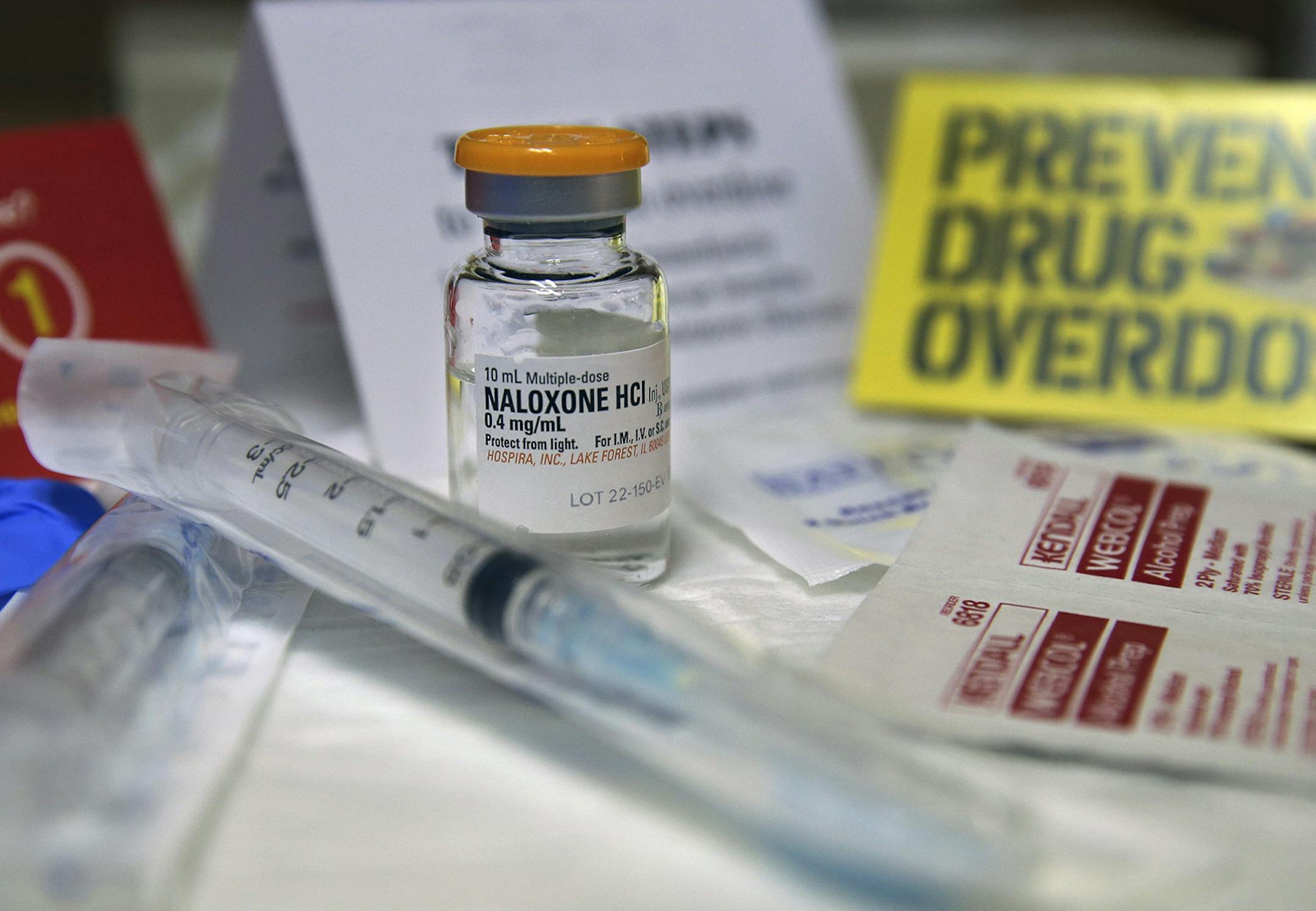 A kit with naloxone, also known by its brand name Narcan, is displayed at the South Jersey AIDS Alliance in Atlantic City, N.J. on Wednesday, Feb. 19, 2014. An overdose of opiates essentially makes the body forget to breathe. Naloxone works by blocking the brain receptors that opiates latch onto and helping the body "remember" to take in air. (AP Photo/Mel Evans) ORG XMIT: MIN2014040912110971