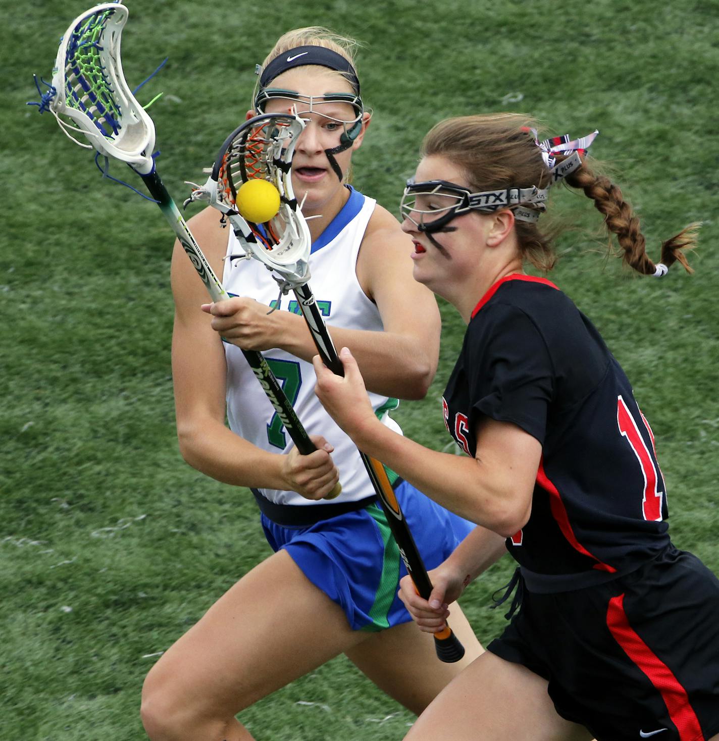 Blake's Jordan Chancellor, left, and Eden Prairie's Claire McCartan fought for control of the ball. ] Girls lacrosse championship game - Eden Prairie vs. Blake . (MARLIN LEVISON/STARTRIBUNE(mlevison@startribune.com)