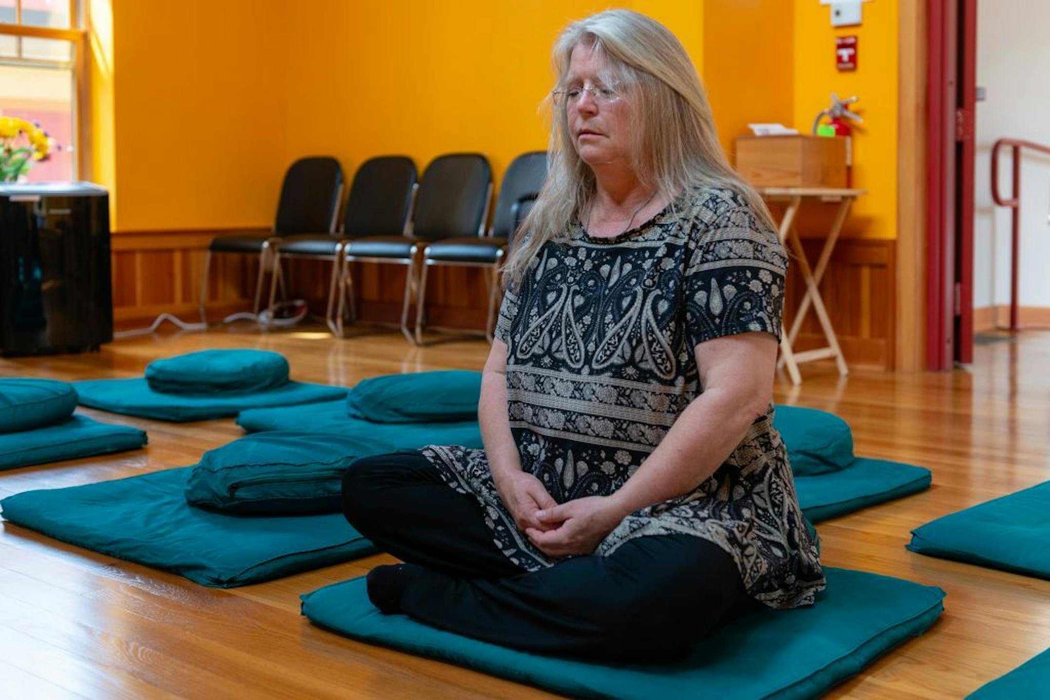 Susan Saran, a longtime Buddhist, often drives to a nearby monastery to practice her faith. Saran is fighting her retirement community over her right to determine how she will die - even though she has made her wishes known in writing. MUST CREDIT: Photo by Heidi de Marco of Kaiser Health News