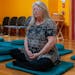 Susan Saran, a longtime Buddhist, often drives to a nearby monastery to practice her faith. Saran is fighting her retirement community over her right 