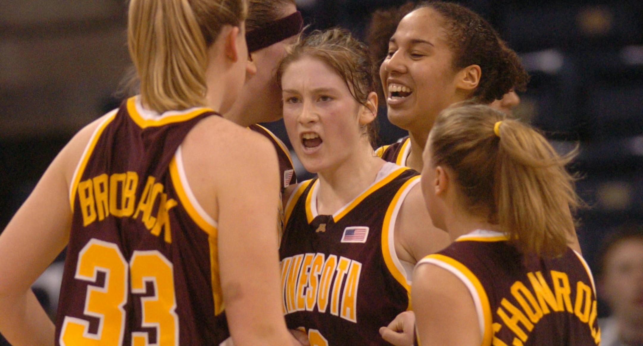 Norfolk, VA. March 30, 2004. NCAA women's regional finals, Minnesota vs. Duke. Lindsay Whalen in the midst of her teammates during their game against Duke.