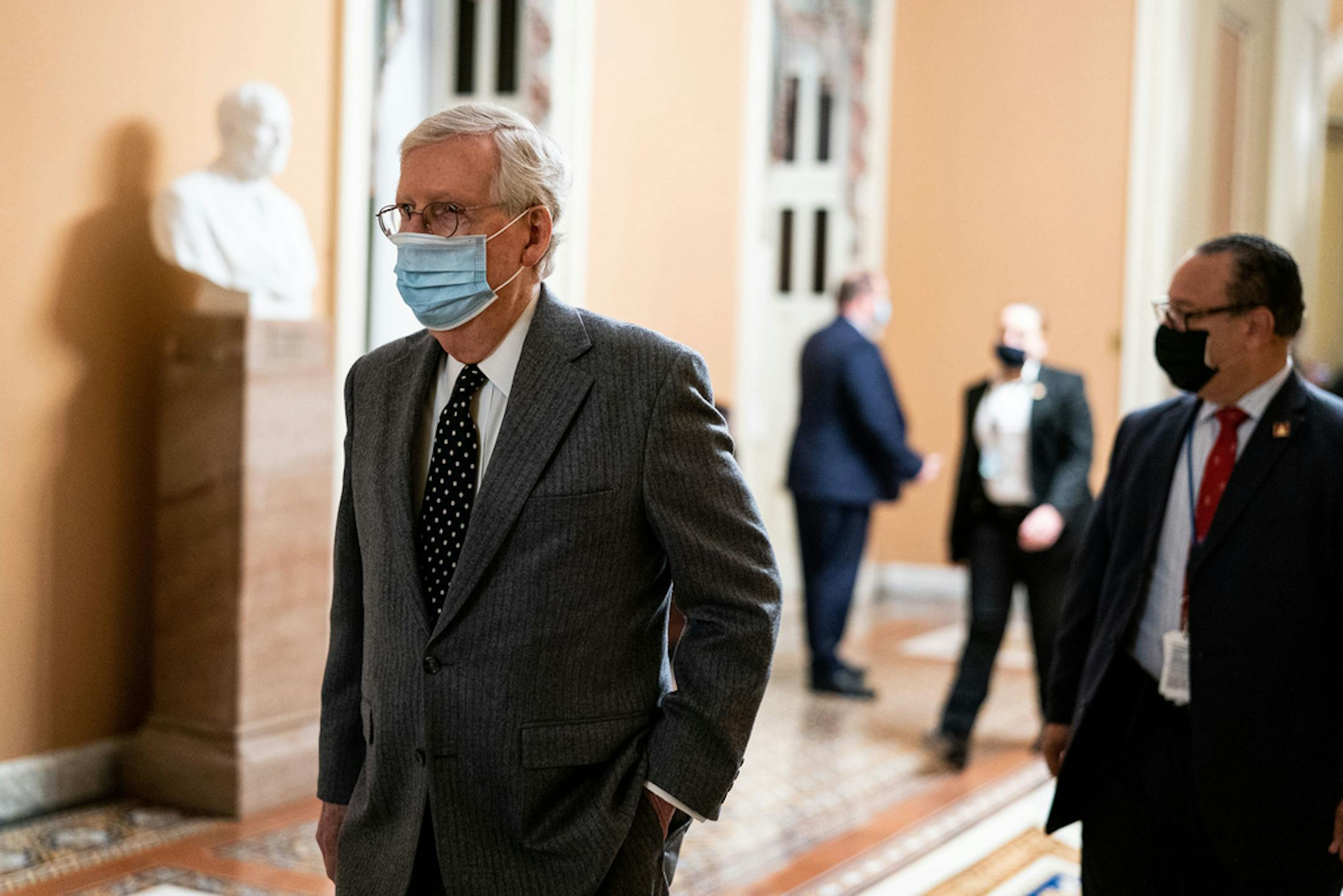 Senate Minority Leader Mitch McConnell (R-Ky.) walks to his office at the Capitol in Washington, Feb. 4, 2021. (Anna Moneymaker/The New York Times)
