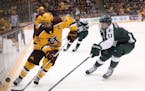 Justin Kloos (left) and the Gophers received the No. 1 seed in the Northeast Regional and will play Notre Dame in the first round of the NCAA hockey t