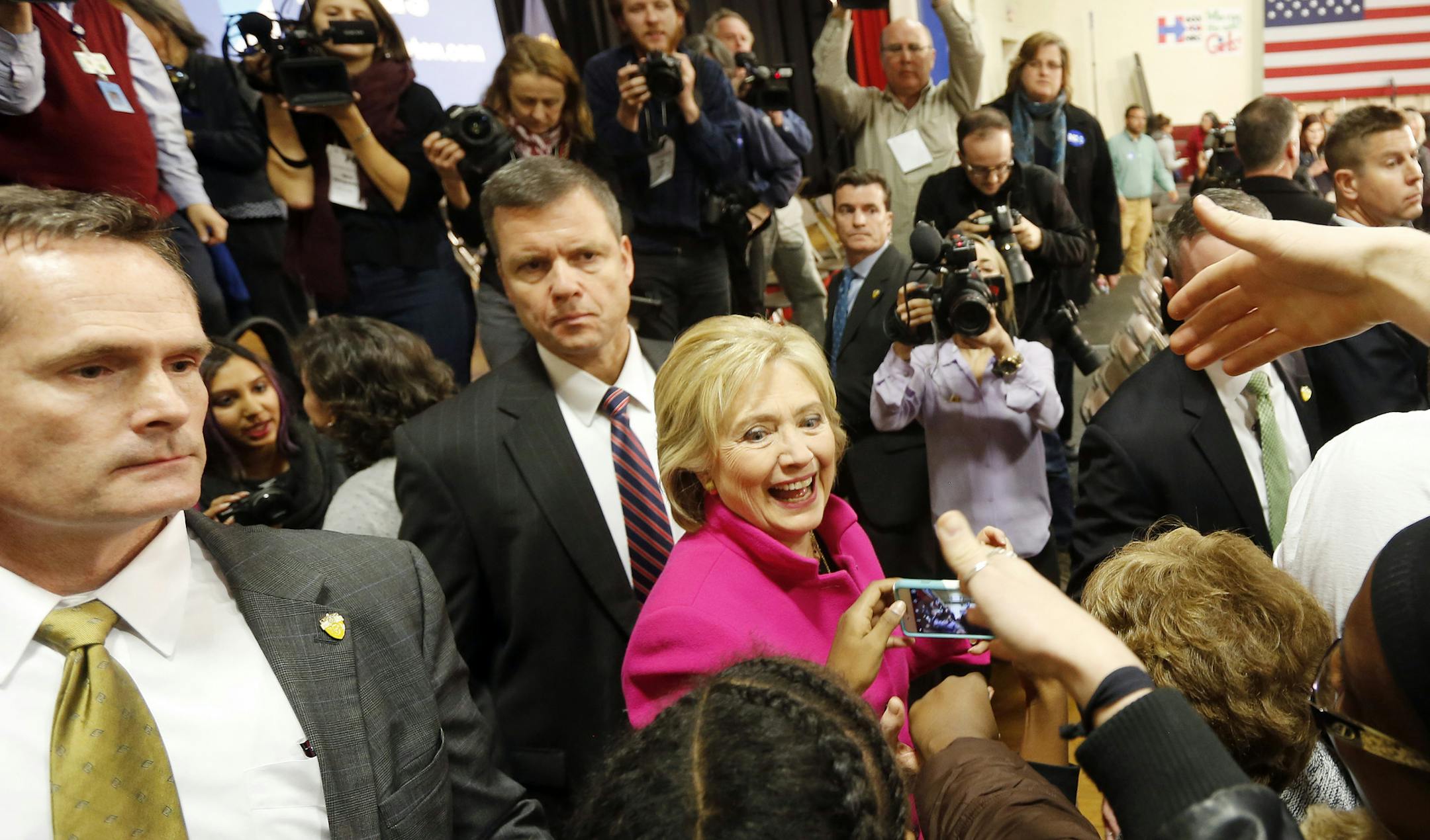 Democratic presidential candidate Hillary Clinton greets voters during a campaign stop Tuesday, Dec. 8, 2015, in Salem, N.H. (AP Photo/Jim Cole)