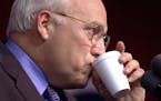 Republican vice presidential candidate Dick Cheney takes a drink while the crowd applauds during his speech in Gallatin, Tenn., on Thursday, Nov. 2, 2