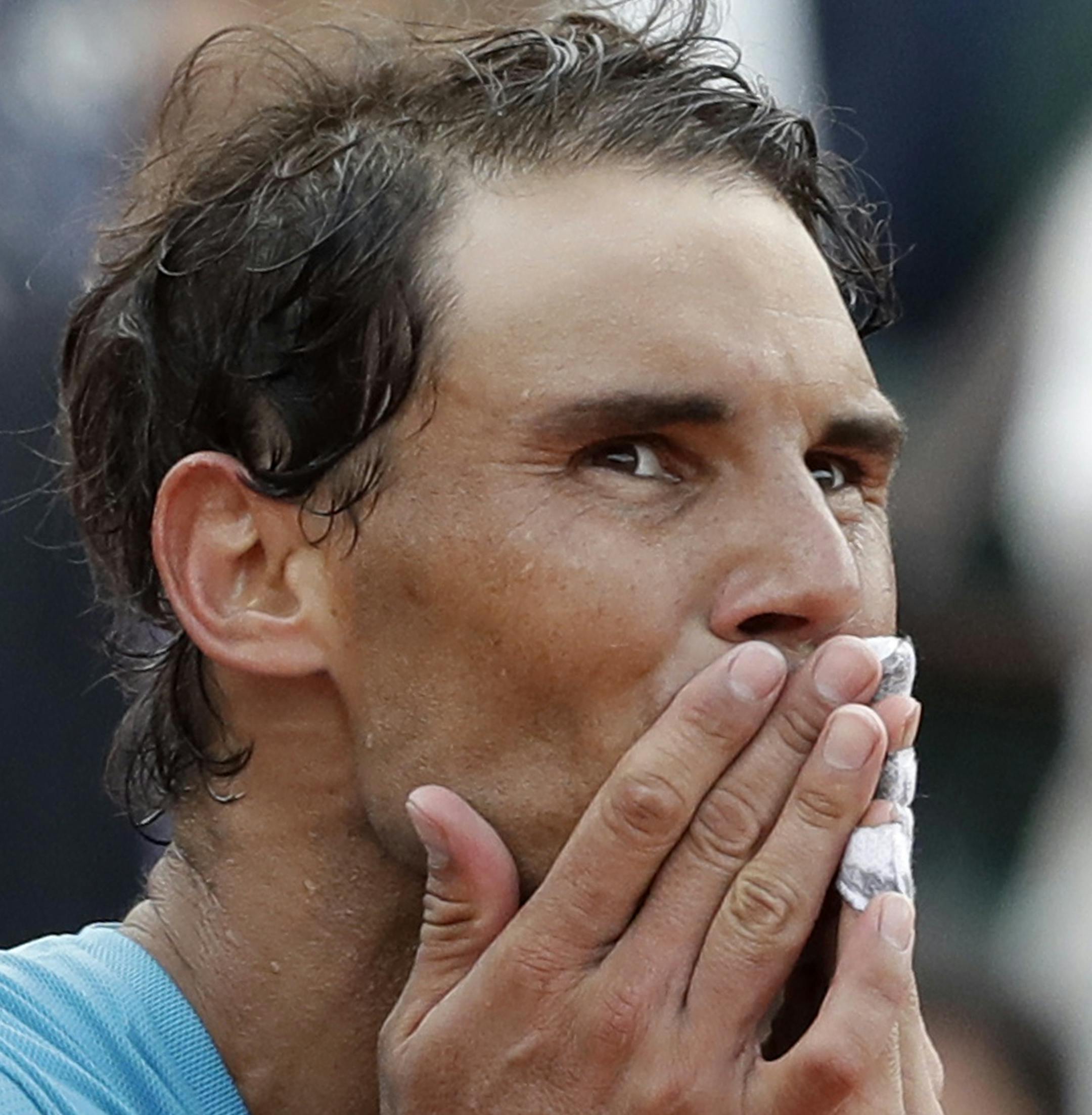 Spain's Rafael Nadal celebrates winning the men's final match of the French Open tennis tournament against Austria's Dominic Thiem in three sets 6-4, 6-3, 6-2, at the Roland Garros stadium in Paris, France, Sunday, June 10, 2018. (AP Photo/Alessandra Tarantino)