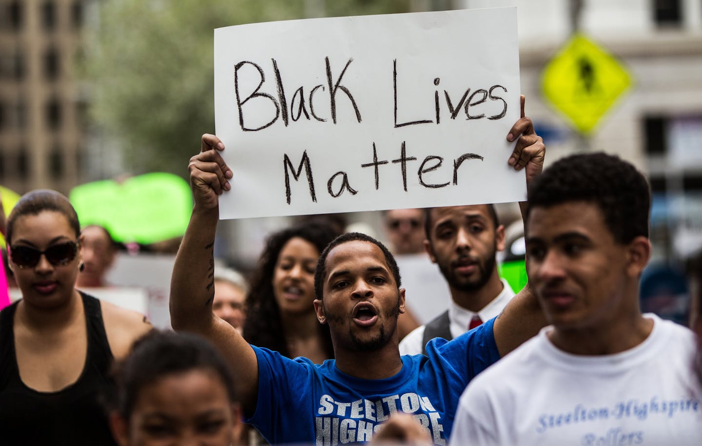 Marcus Mulberry, of Steelton, marches with others down Third Street during a Baltimore solidarity rally, Saturday, May 2, 2015 in Harrisburg, Pa. (James Robinson/PennLive.com via AP) ORG XMIT: MIN2015061212211828