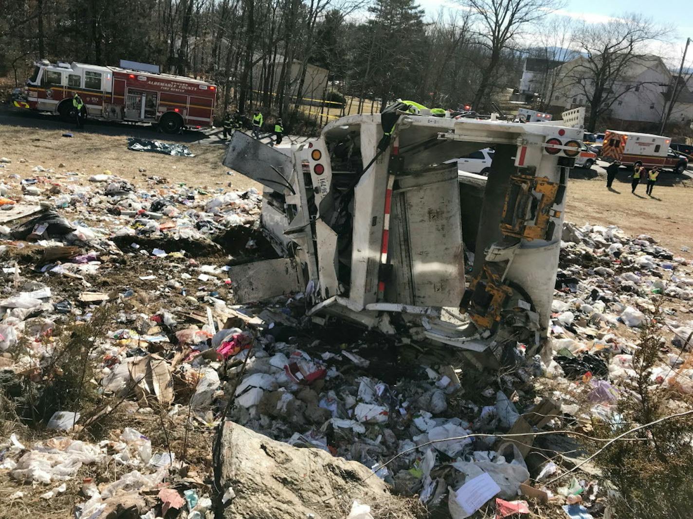 This photo provided by Rep. Greg Walden, R-Oregon, shows a crash site near Crozet, Va., Wednesday, Jan. 31, 2018. A chartered train carrying dozens of GOP lawmakers to a Republican retreat in West Virginia struck a garbage truck south of Charlottesville, Virginia on Wednesday, lawmakers said. (Rep. Geg Walden via AP)