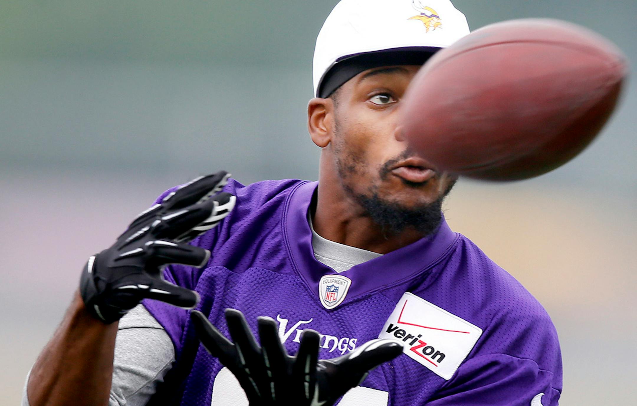 Jerome Simpson pulls down a pass during NFL camp at Minnesota State Mankato Saturday July 26, 2014 in Mankato, MN .