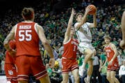 Oregon guard Brennan Rigsby (4) takes a shot against Utah on March 9 in Eugene, Ore.