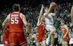 Oregon guard Brennan Rigsby (4) takes a shot against Utah on March 9 in Eugene, Ore.