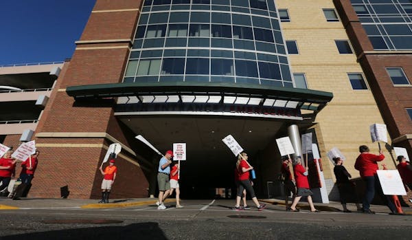 Thousands of nurses walked around Abbott Northwestern hospital on the first day of a strike in June.