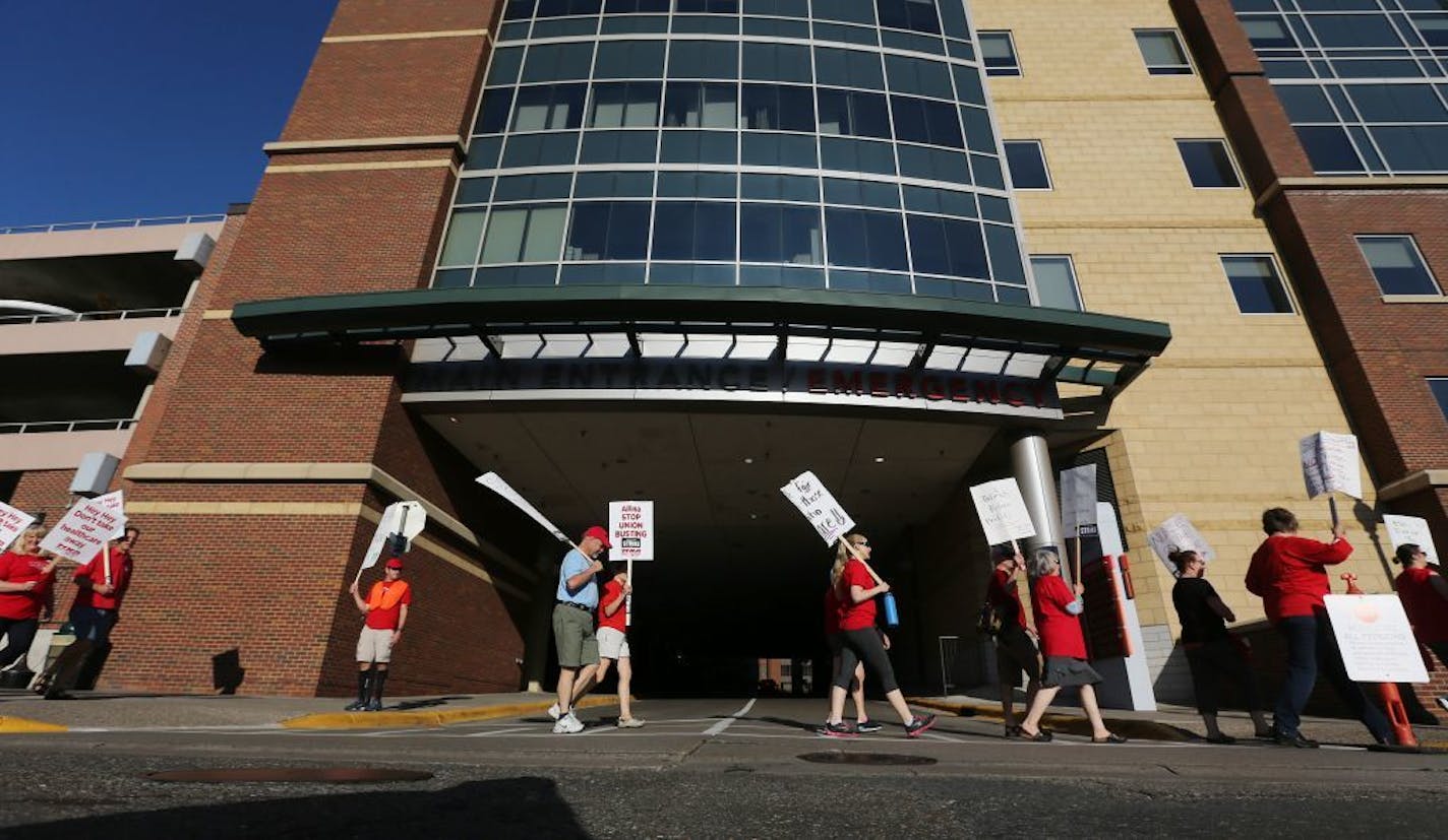 Thousands of nurses walked around Abbott Northwestern hospital on the first day of a strike in June.