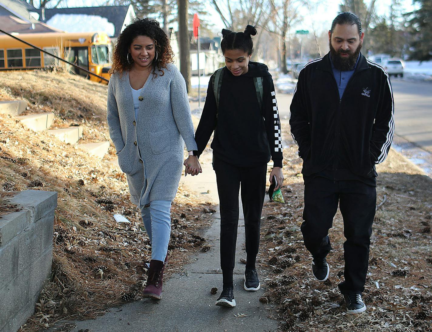 Stephanie Gasca, left, — seen with her daughter Kennedy and her fiancé, Jimmy Patino — is skeptical the plan to plan to radically reshape Minneapolis public schools will shrink the achievement gap.