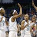 From left to right, Minnesota Lynx's Rashanda McCants (8), Candice Wiggins, Renee Montgomery (20) and Roneeka Hodges celebrate as they return to the b