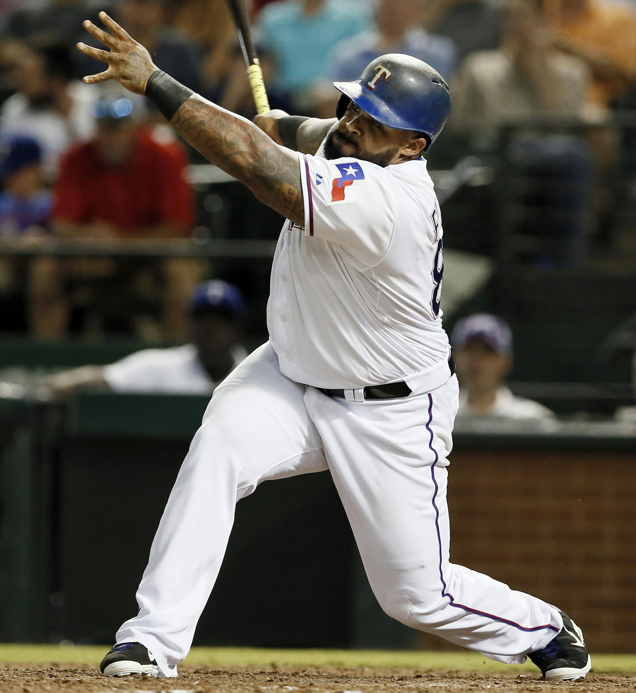 Texas Rangers' Prince Fielder follows through on a swing in the seventh inning of a baseball game against the New York Yankees Wednesday, July 29, 2015, in Arlington, Texas. (AP Photo/Tony Gutierrez) ORG XMIT: MIN2015091115551378