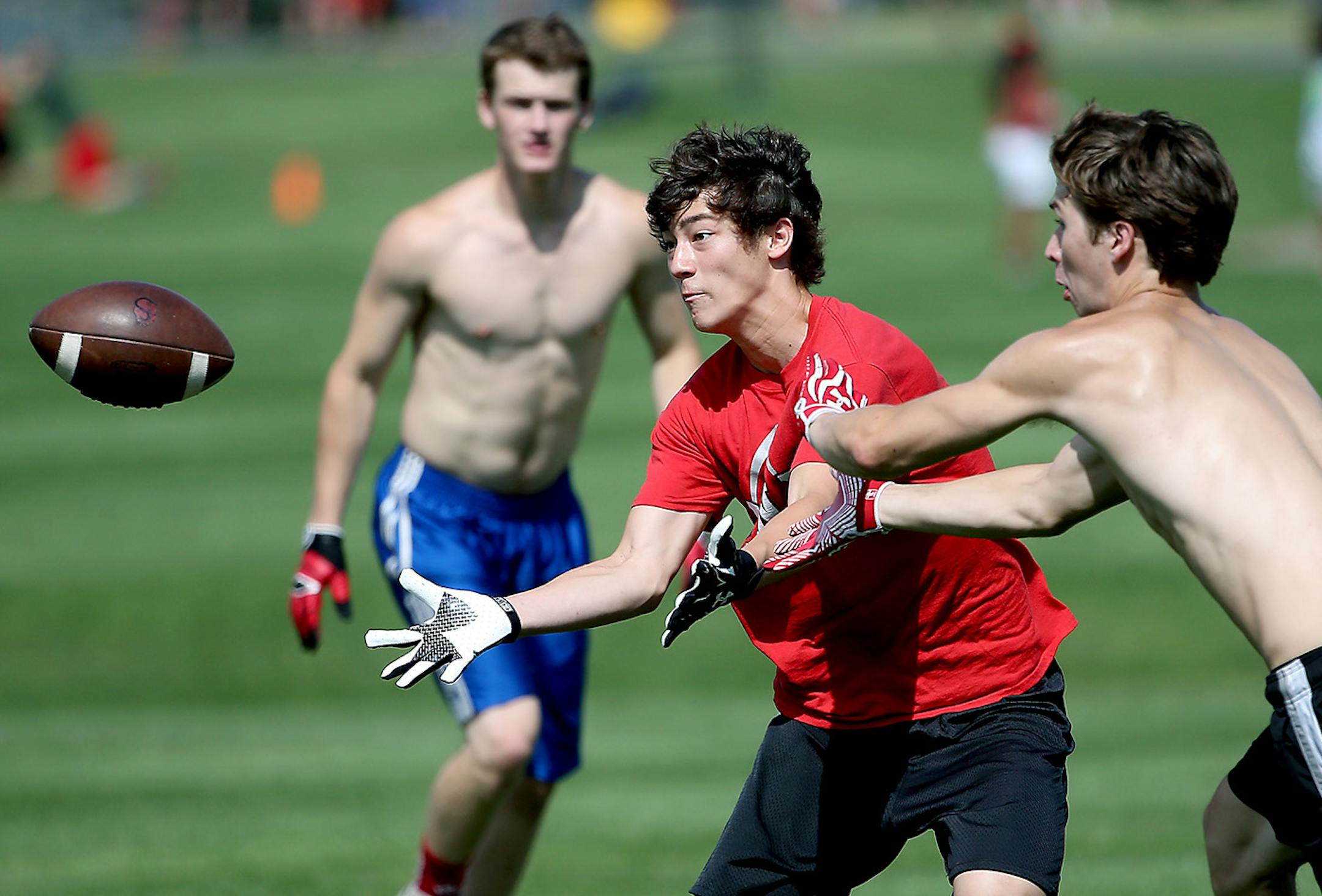 Stillwater’s Justin DeShaw made a grab during a practice. It’s all about passing — and passing defense — in 7-on-7 football, with no linemen and no direct contact allowed.