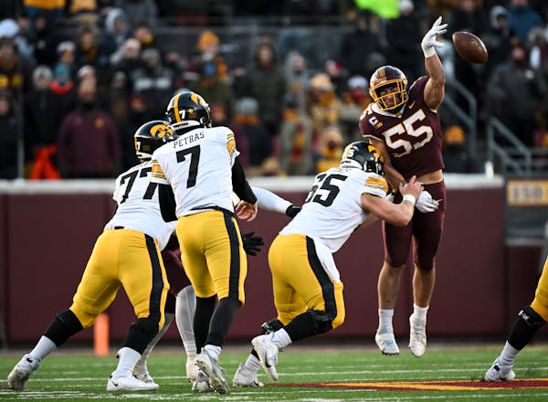 Gophers linebacker Mariano Sori-Marin (55) tipped a pass from Iowa’s Spencer Petras during Saturday’s game at Huntington Bank Stadium. He and Minn