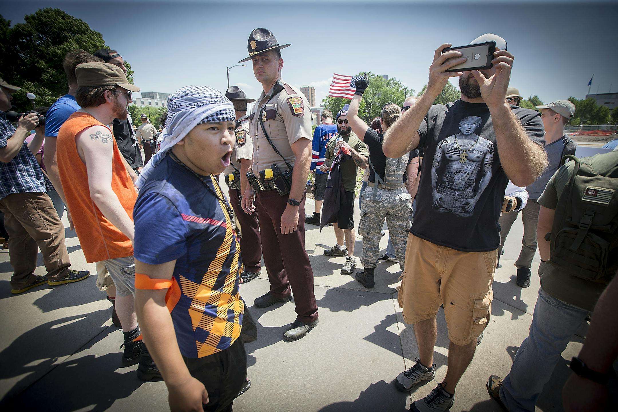 An anti-Sharia law group and antifascist protesters clashed during dueling rallies at the Minnesota State Capitol, Saturday, June 10, 2017 in St. Paul, MN. When a small faction of the anti-sharia group challenged the protesters outside, the Minnesota State Patrol had to intervene.