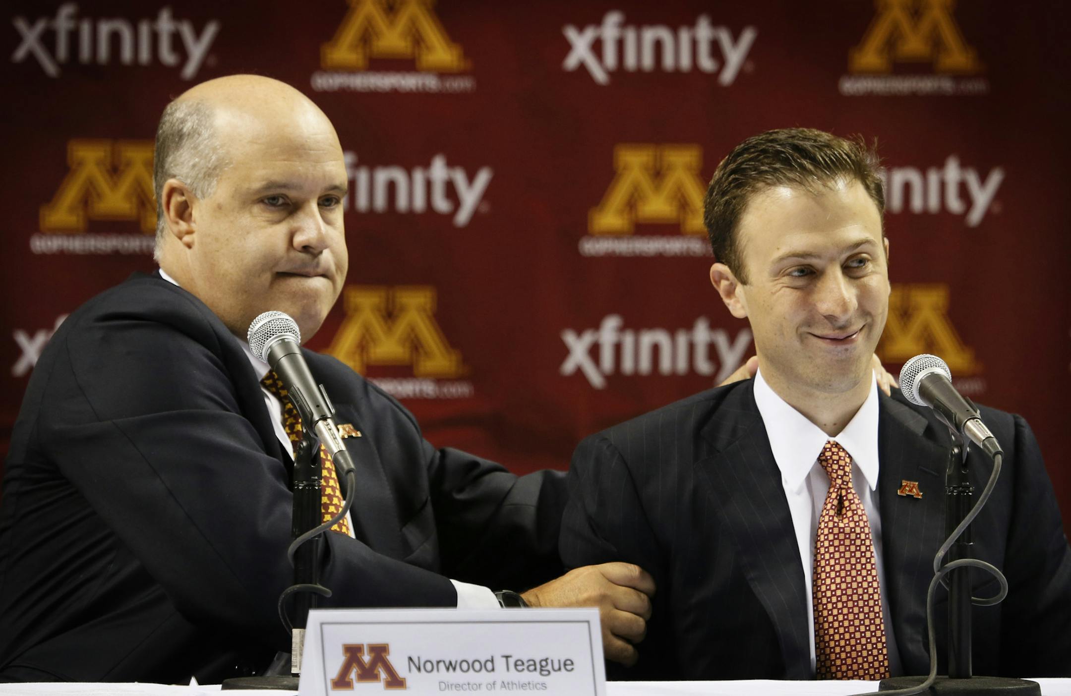 Minnesota Athletic Director Norwood Teague and Richard :Pitino