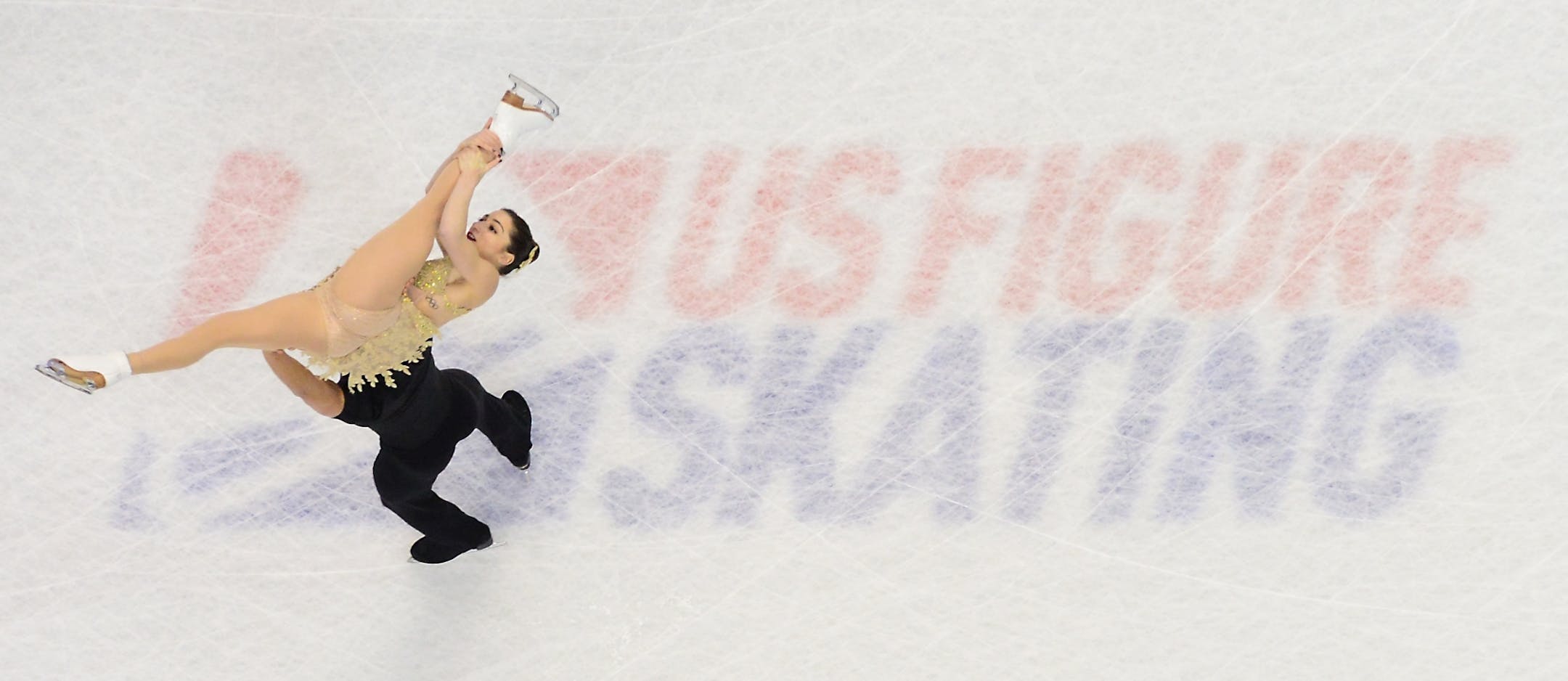 Marissa Castelli and Mervin Tran performed the lift component of their championship pairs short program performance Thursday. The pair took third place with a score of 64.12.