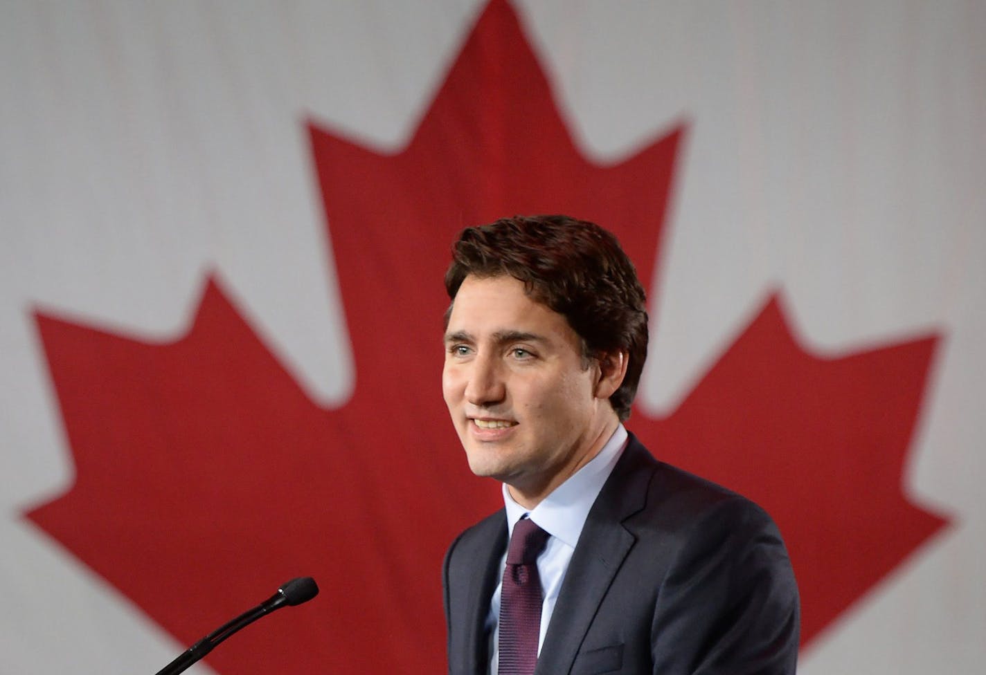 Liberal leader Justin Trudeau stands on stage at the Liberal party headquarters in Montreal, Tuesday, Oct. 20, 2015. Trudeau, the son of late Prime Minister Pierre Trudeau, became Canada&#x2019;s new prime minister after beating Conservative Stephen Harper. (Sean Kilpatrick/The Canadian Press via AP) MANDATORY CREDIT