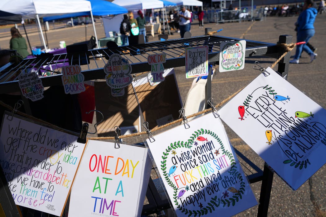 Artwork with inspirational messages was for sale at several booths during the Rise for Roe event Saturday in St. Paul.
