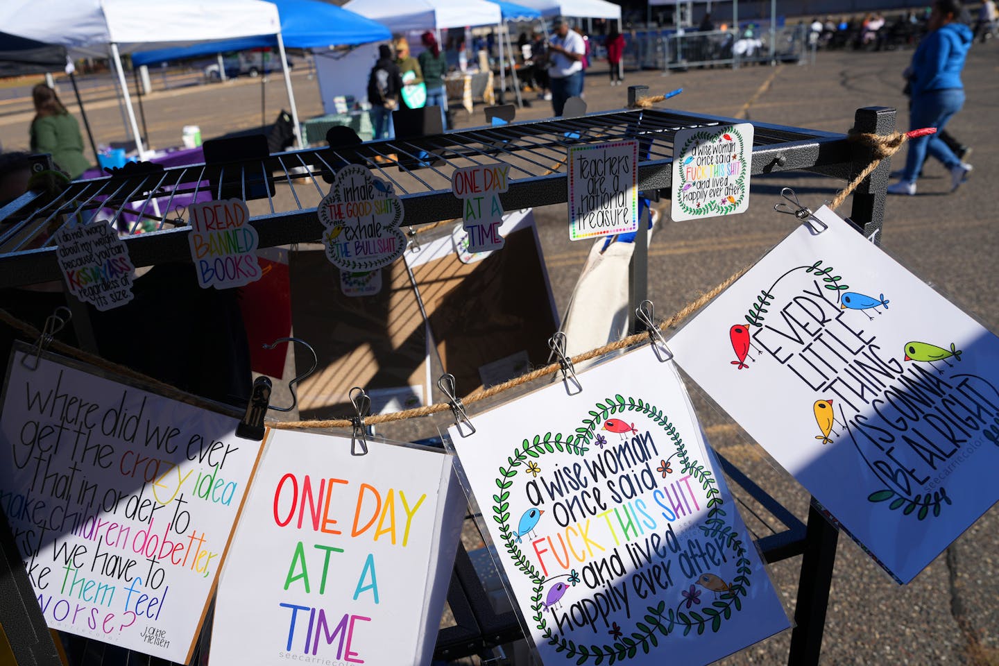 Artwork with inspirational messages was for sale at several booths during the Rise for Roe event to rally voters for the DFL Saturday, Oct. 29, 2022 in the Sears parking lot in St. Paul, Minn. ] ANTHONY SOUFFLE • anthony.souffle@startribune.com