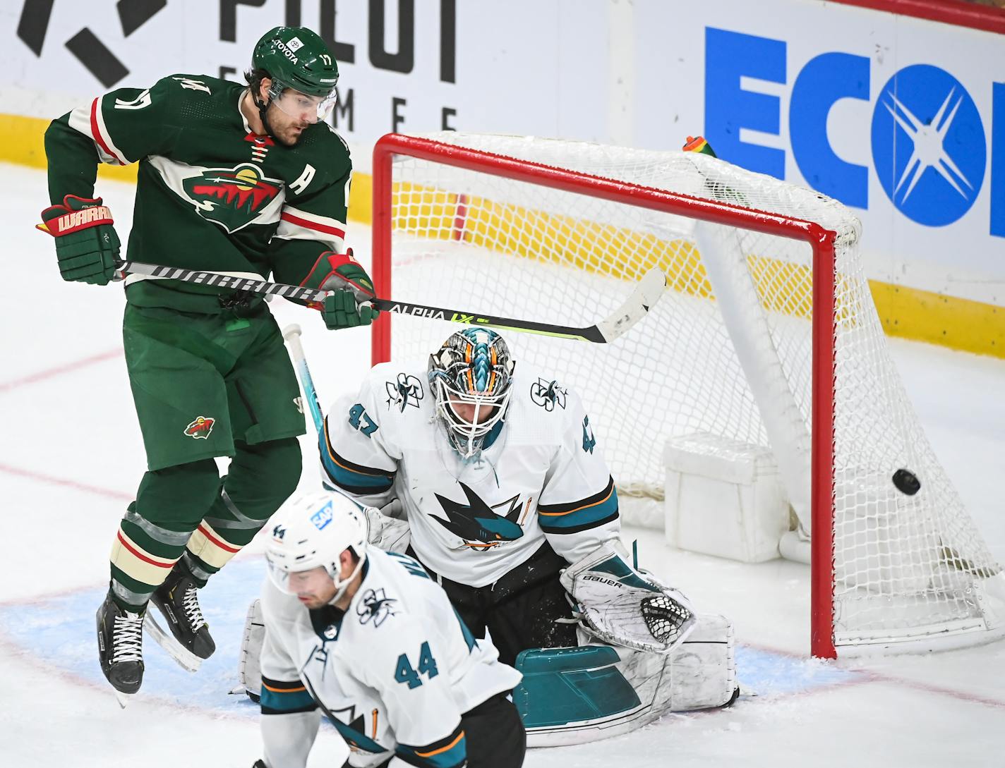 Minnesota Wild left wing Marcus Foligno (17) hops to try to redirect a shot as San Jose Sharks goaltender James Reimer (47) makes the save in the third period Tuesday, Nov. 16, 2021 at the Xcel Energy Center in St. Paul, Minn. ] AARON LAVINSKY • aaron.lavinsky@startribune.com