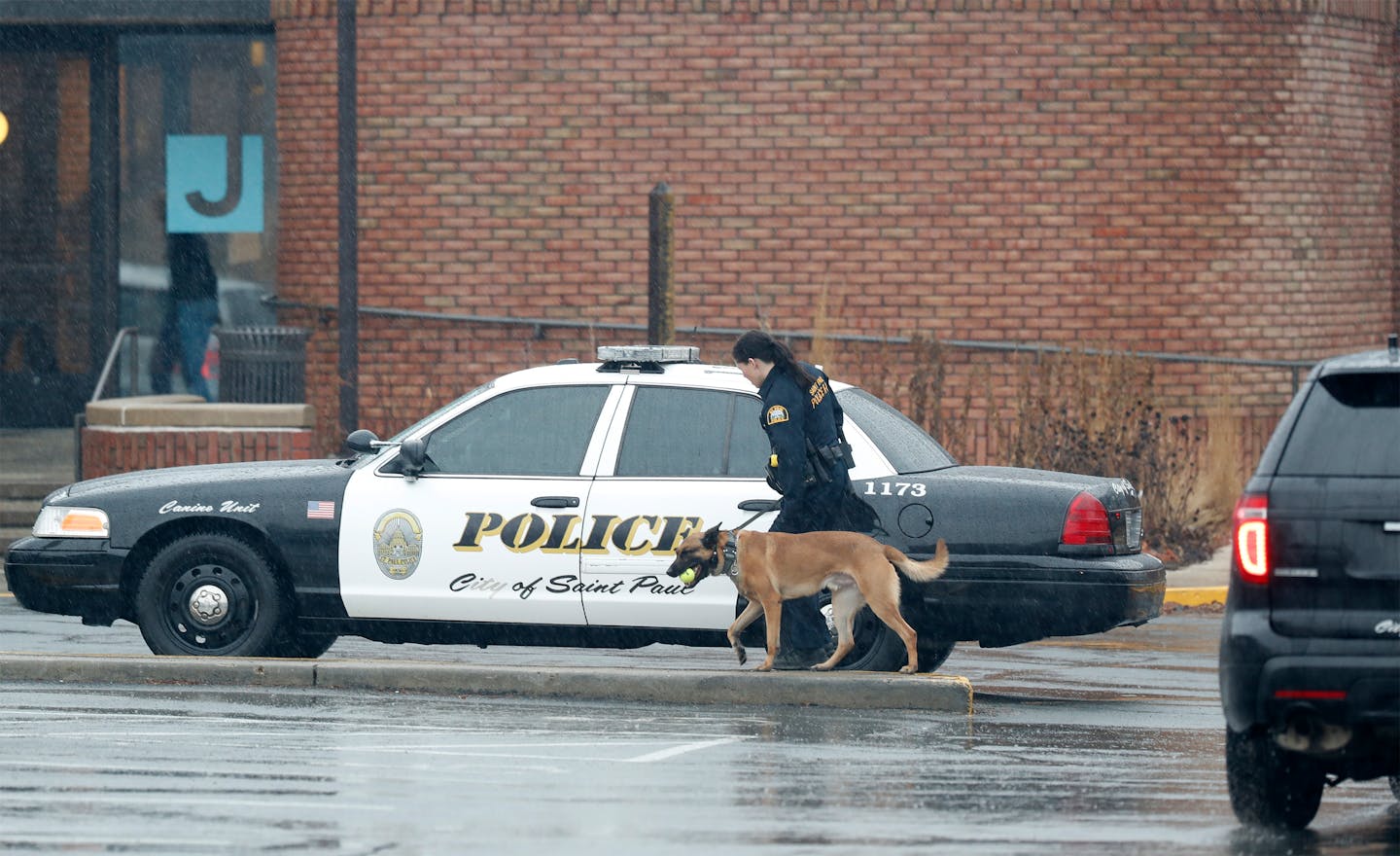 A St. Paul police officer, seen at the scene of a suspected crime in 2017